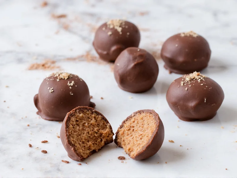 Homemade chocolate truffles on marble surface