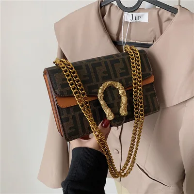 

HOT sell women handbag with metal lock special grain pu leather luxury handbags versatile sling crossbody shoulder bag