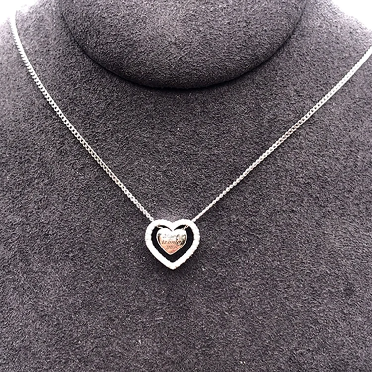 "Love Is Only You" Letter Engraved Heart In A Hollow Heart Design Necklace