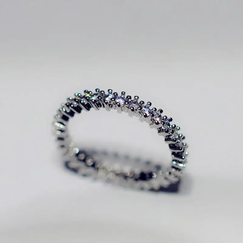 

Fashion Jewelry Manufacturer direct KYRA0621 CZ Rings Simple designs 3A Zircon Eternity Band Rings for Women, Silver