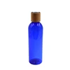 /product-detail/biodegradable-blue-plastic-bottle-lotion-bottle-bamboo-flip-cap-62239524618.html