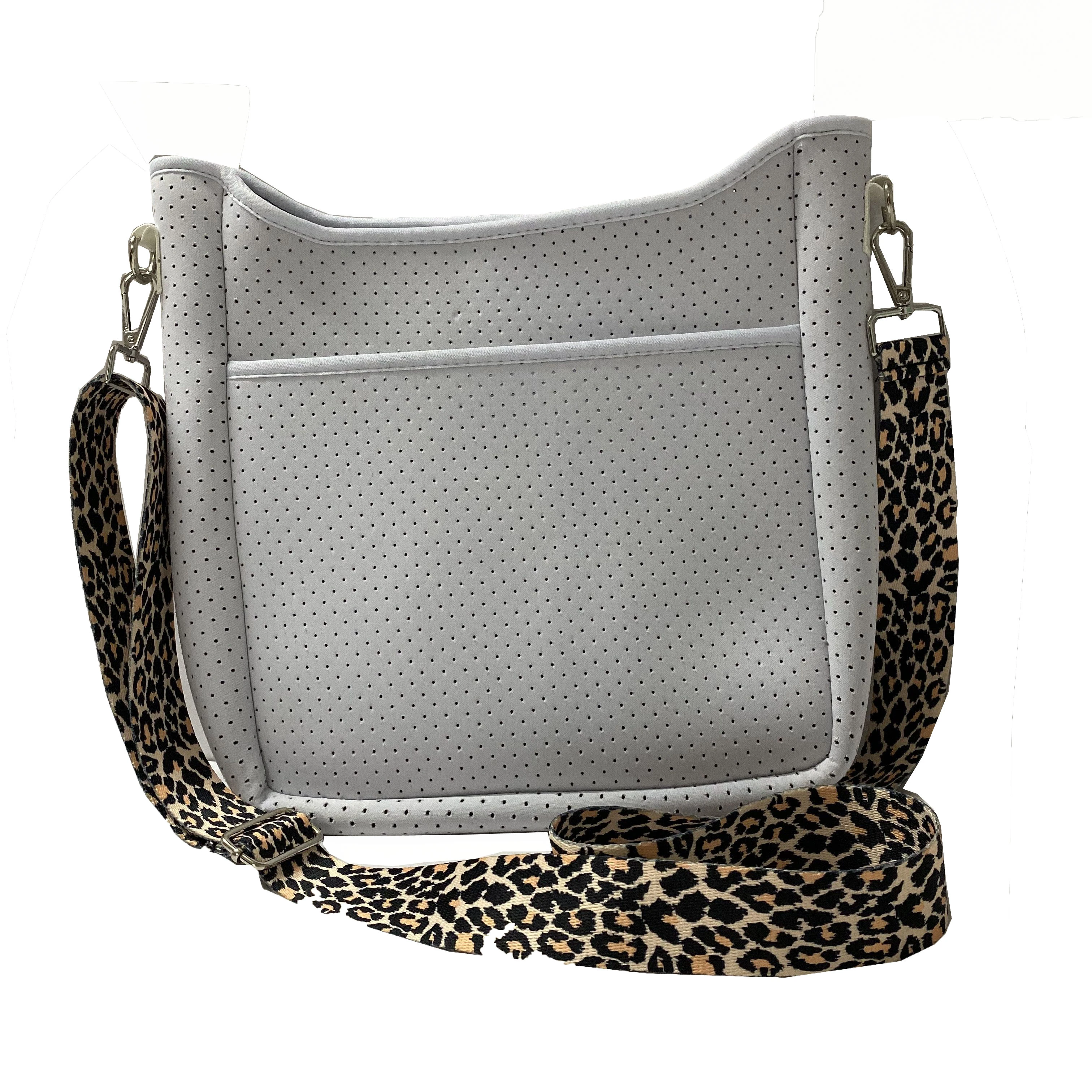 

white neoprene crossbody bag with leopard strap