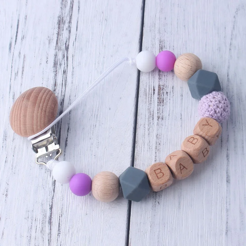 

Wholesale Food Grade Silicone Wood Beads Baby Teething Holder Wooden Pacifier Clip