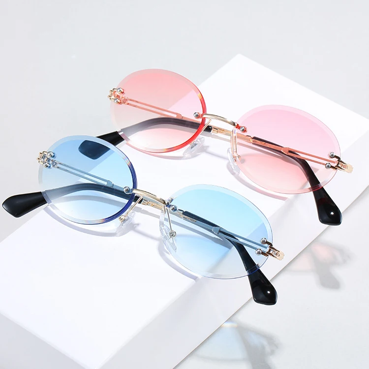 

DOISYER Customized logo trendy designer gold oval custom temple tac lens women gradient rimless sunglasses