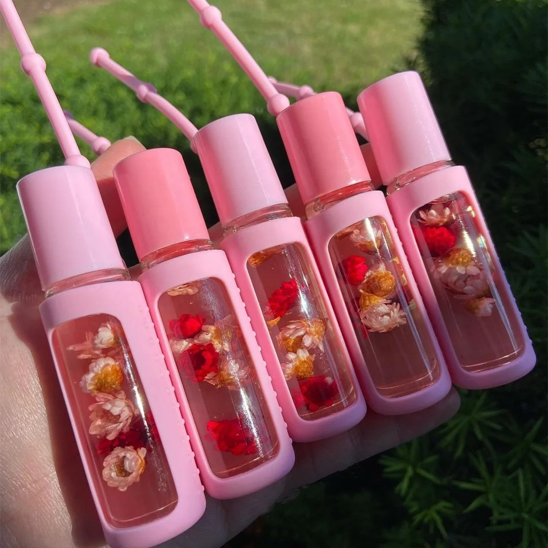 

2021 New Lip Private Label Lipgloss New Bomb Clear Flower Balm Cosmetics Cruelty Free Roll On Make Your Own Lip Gloss Oil