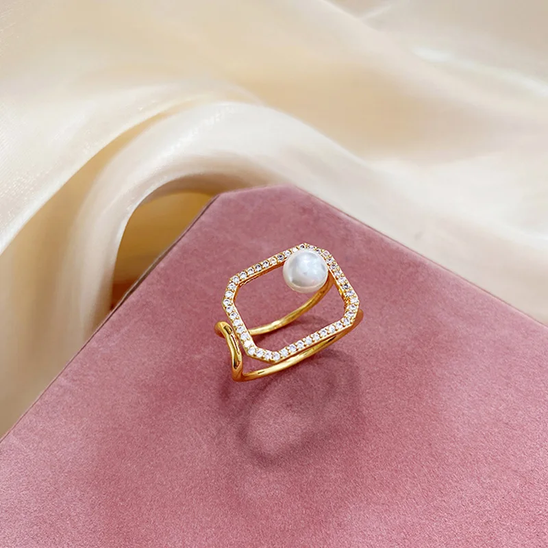 

trendy jewelry gold color pearl hollow couple ring