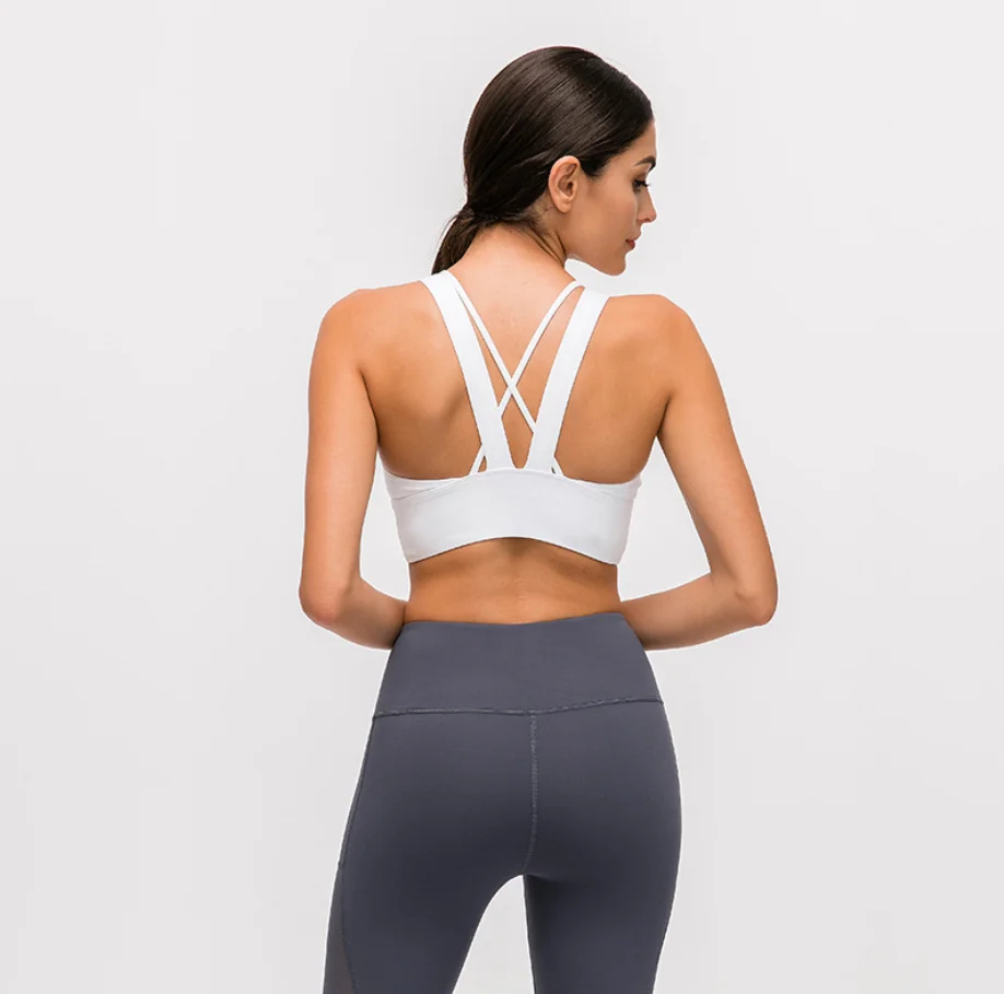 

Custom Logo Women Fitness High Impact Strappy Backless Cross Yoga Crop Top Seamless Hot Sexy Solid Color White Sports Bra