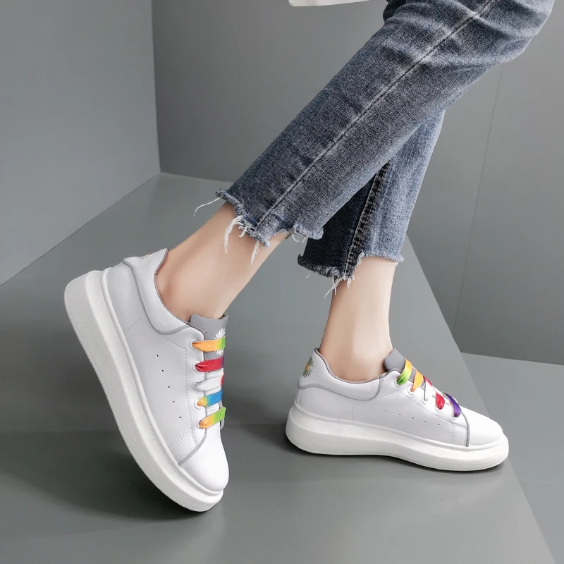 white shoes with colourful lace