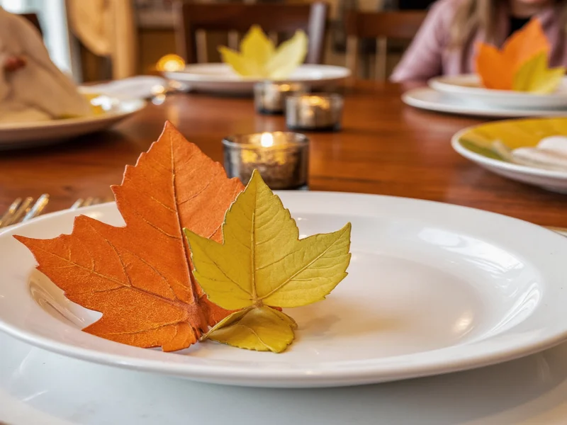 Handmade leaf place card holders on Thanksgiving table