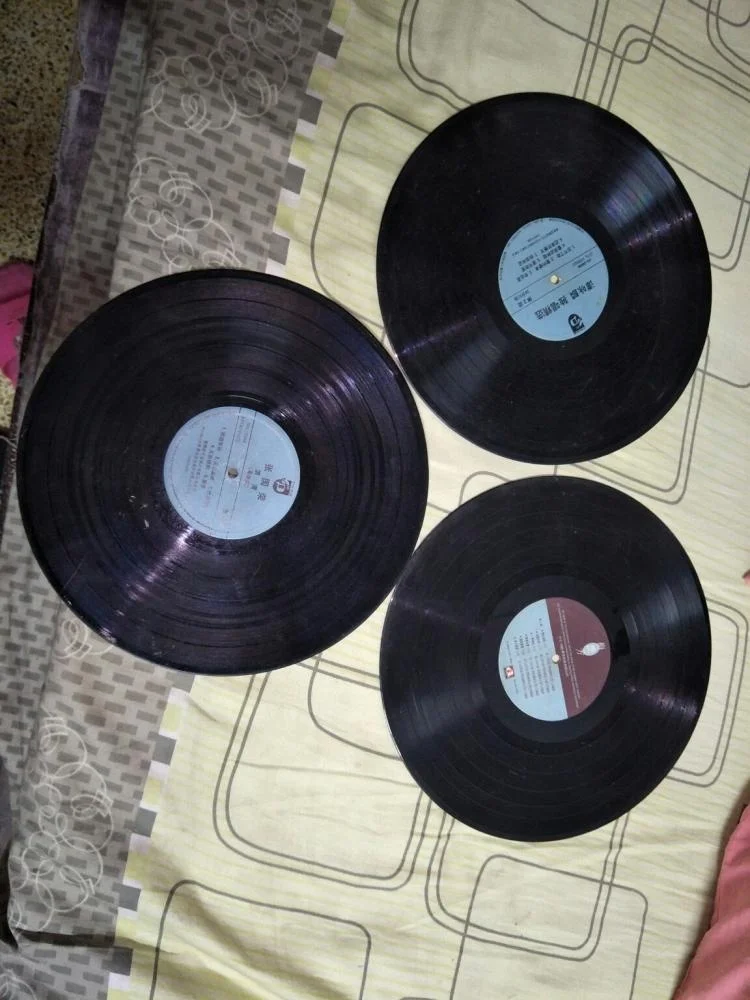 
Black LP (Vinyl records) manufacturing in white paper sleeves 