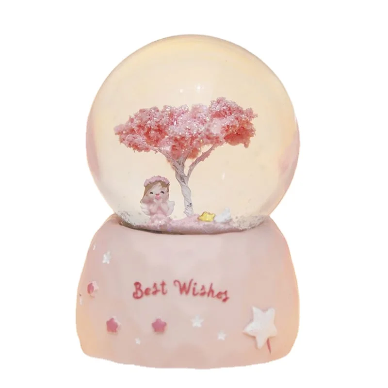 

Resin Mini Custom Made Snow Globes For Sale With Tree And Girl Music Box Decoration Birthday Gifts For Kids Daughter Girl