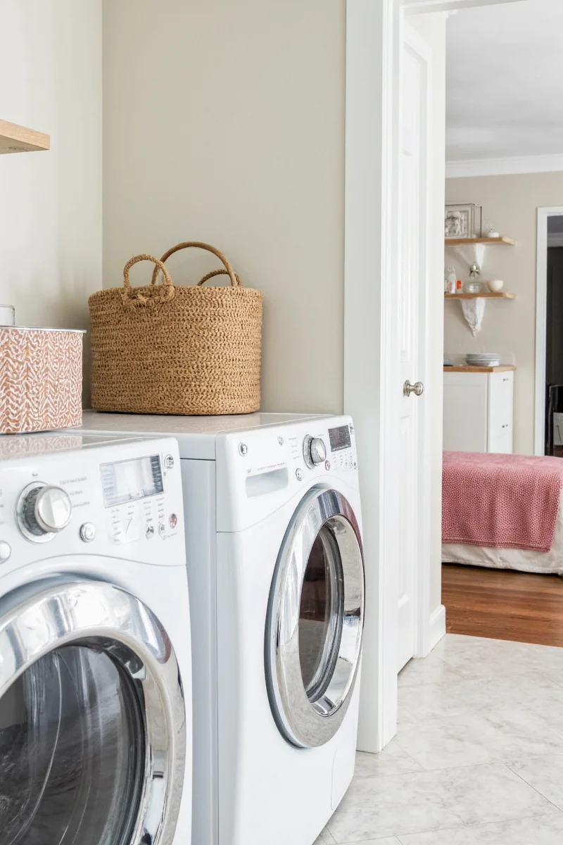 Laundry room with playful wall art