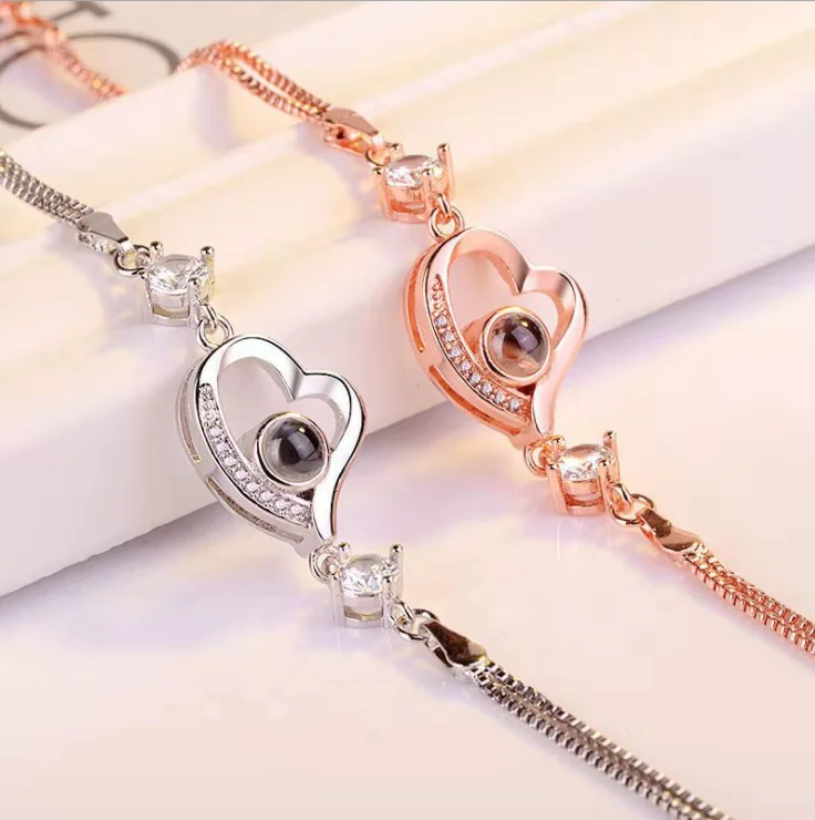 

Hot sale adjustable i love you in 100 language love heart bracelet