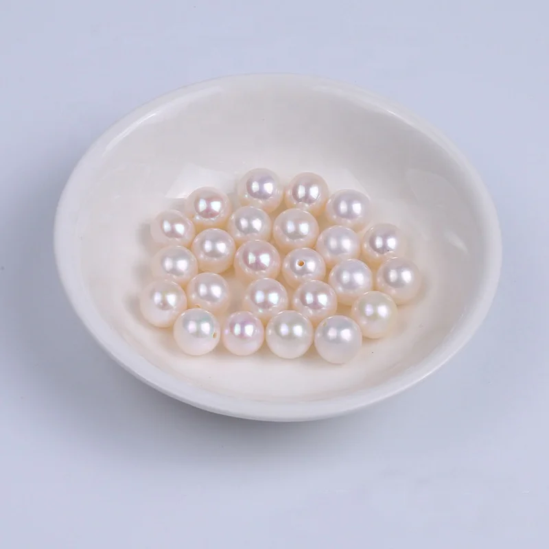 

Zhuji Cultured Natural Freshwater Pearls 2A Quality Bulk Wholesale Price Half Drilled Round Pearls for Earrings Rings