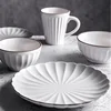 /product-detail/handmade-fancy-stoneware-dinner-set-ivory-white-color-japanese-ceramic-dinnerware-62315199071.html