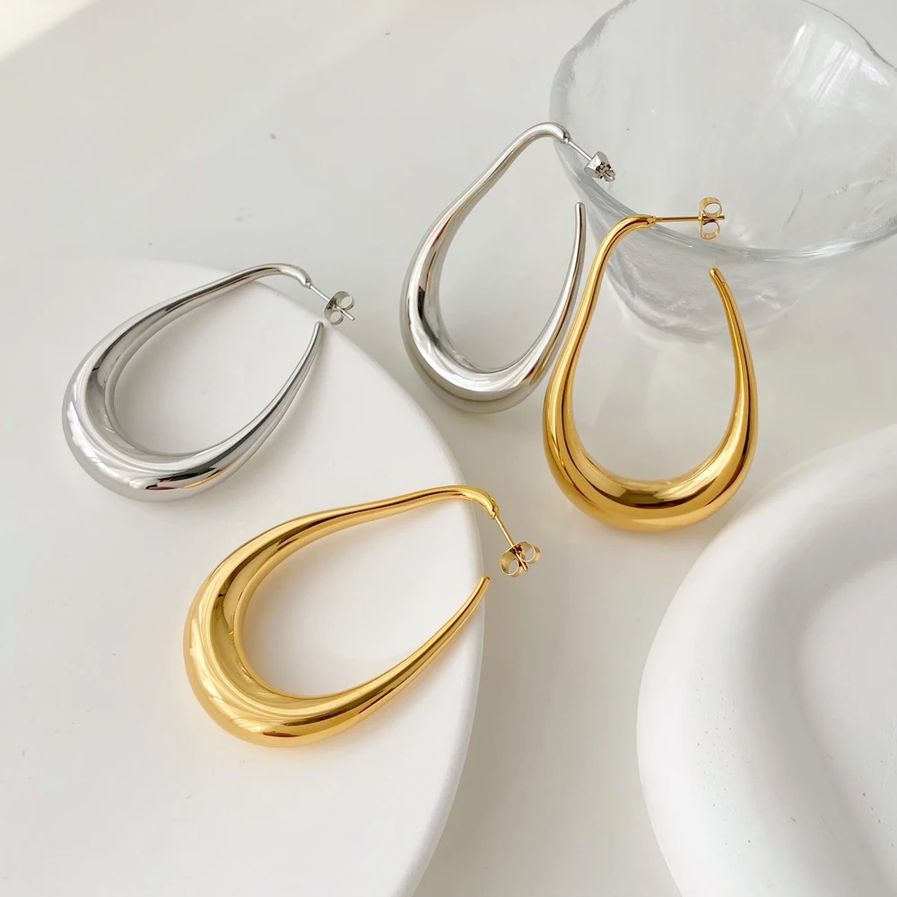 

Simple and exaggerated HOOP earring jewelry Stainless steel gold-plated 18K hollow curved large hook U-shaped earrings