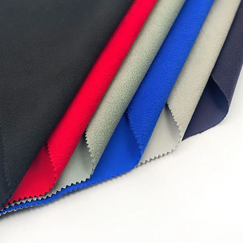 

Wholesale waterproof 100% polyester laminated 4 way stretched bonded soft shell anti pilling polar fleece fabric for jacket