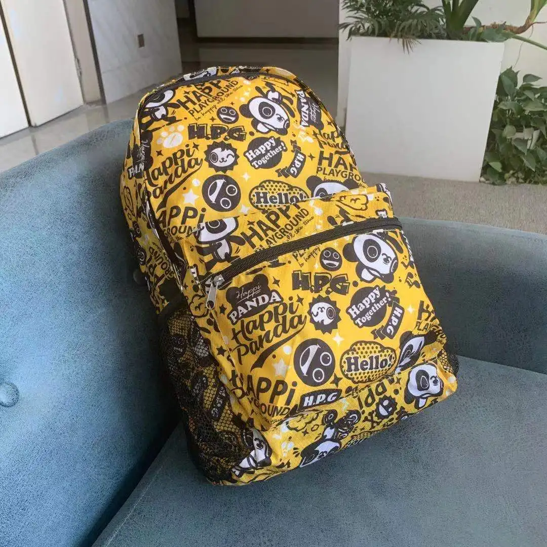 

Light weight diamond 420D polyester economic foldable backpack with all over cartoon pattern printing, Can be customized