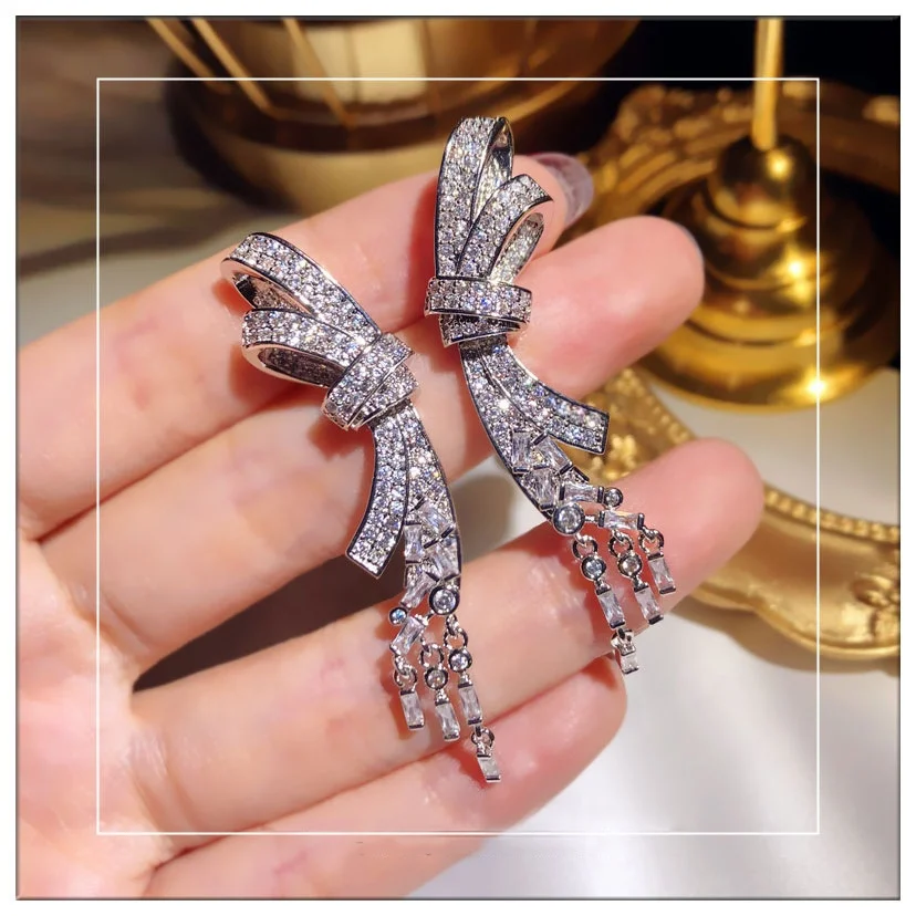 

fashion Korean jewelry woman pendant earrings tassel stainless steel designer needle zircon bow tassel earrings