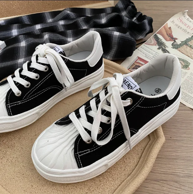 

Thick-soled casual women's canvas shoes 2021 fashion new niche retro big head shoes
