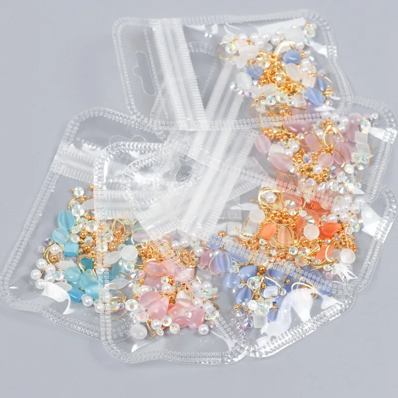 

Hoy sale 200pcs per bag high quality glass ab nail art crystal cat eye diamond nail art rhinestone for nail art DIY