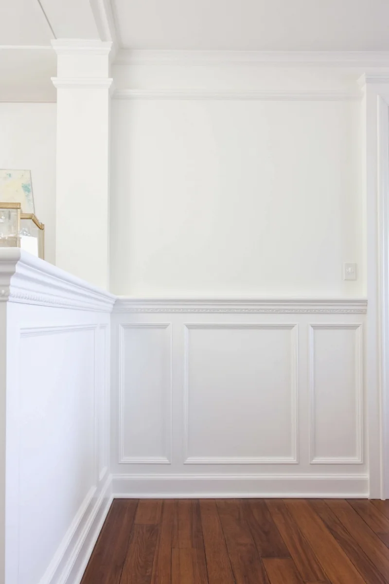 After: beadboard wainscoting added with hooks and bench