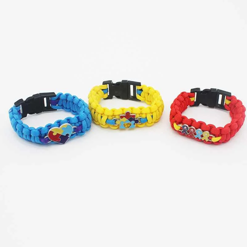 

fashion metal heart puzzle ribbon autistic breast cancer charm Survival bracelet woven hand strap parachute cord