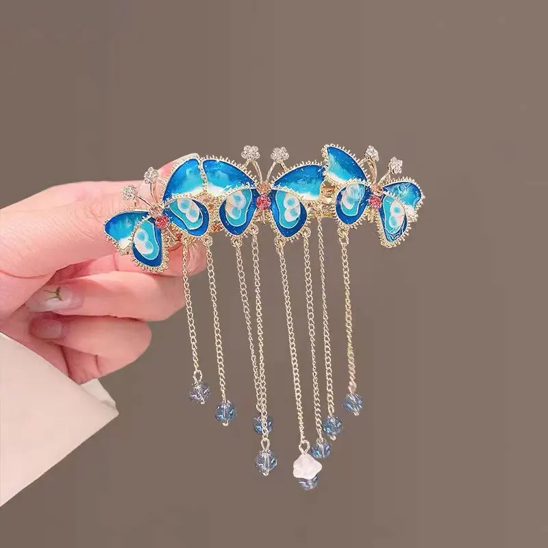 

Accesorios para el cabello Women Hair Spring Clip Head Ornament Barrette Rhinestone Blue Butterfly Tassel Hairpin