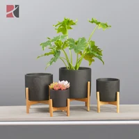 

Mid Century Modern Concrete Plant Pot Indoor Decor Cement Flower Pots Planter with Bamboo Stand
