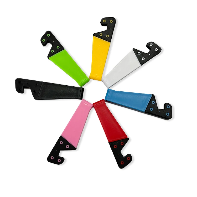

Cheap V Shape Foldable Portable Plastic Universal Mobile PHone Tablet Holder Desk Tablet Lazy Phone Stand Customized Logo, Black , white, red etc