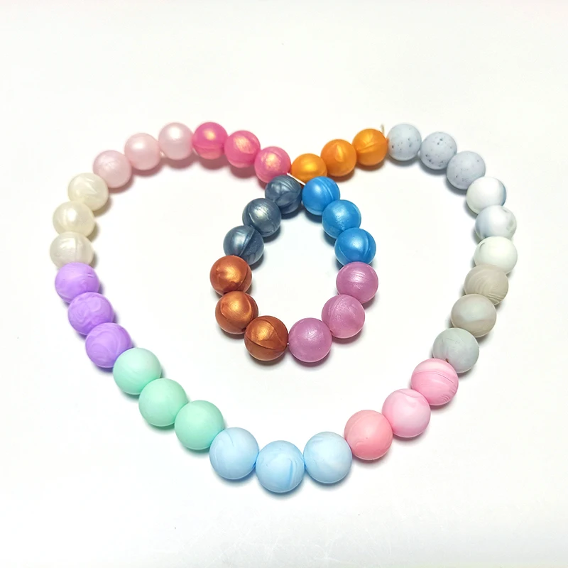 

Bpa Free Teething Loose Beads Food Grade Non Toxic Round Silicone Chew 99 Colors 12mm Soft Bulk Silicone Beads