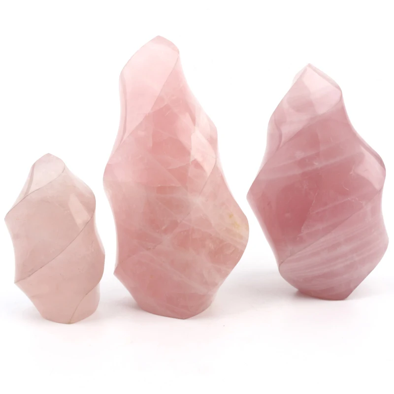 

Natural crystal gemstone hand-carving polished fire rose quartz torch flame