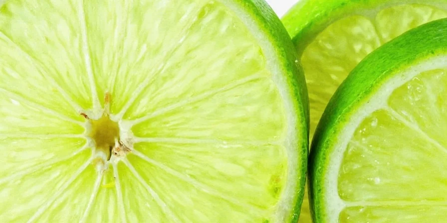 Lime zest added to a colorful salad
