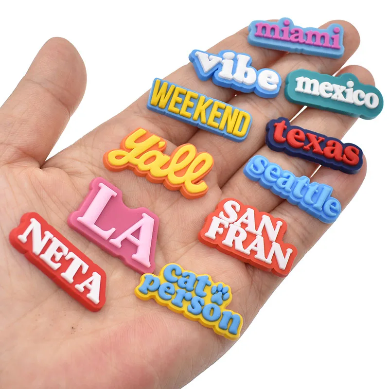 

New Arrival Wholesale Cheap PVC Shoe Charms Character LA BAE Words Croc Shoe Decoration Wristband Accessories for Kids, Accept customized