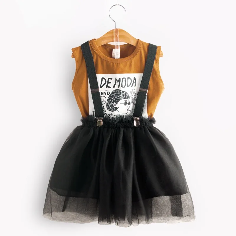 

Wholesale toddler girls clothing set cartoon printed top + black tulle suspender skirt Clothing set for kids, Picture shows