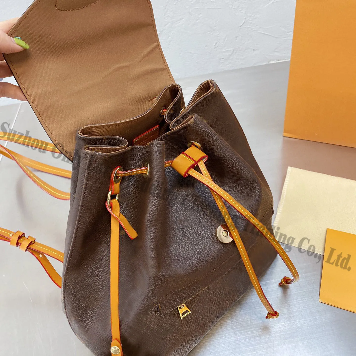

Classical Leather Brown backpack Flap Bag For lady