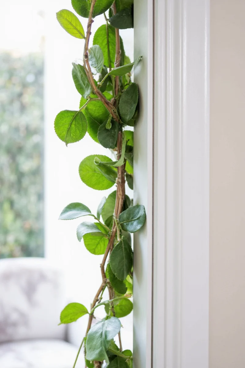 Using an over-the-door hanger to hang garland
