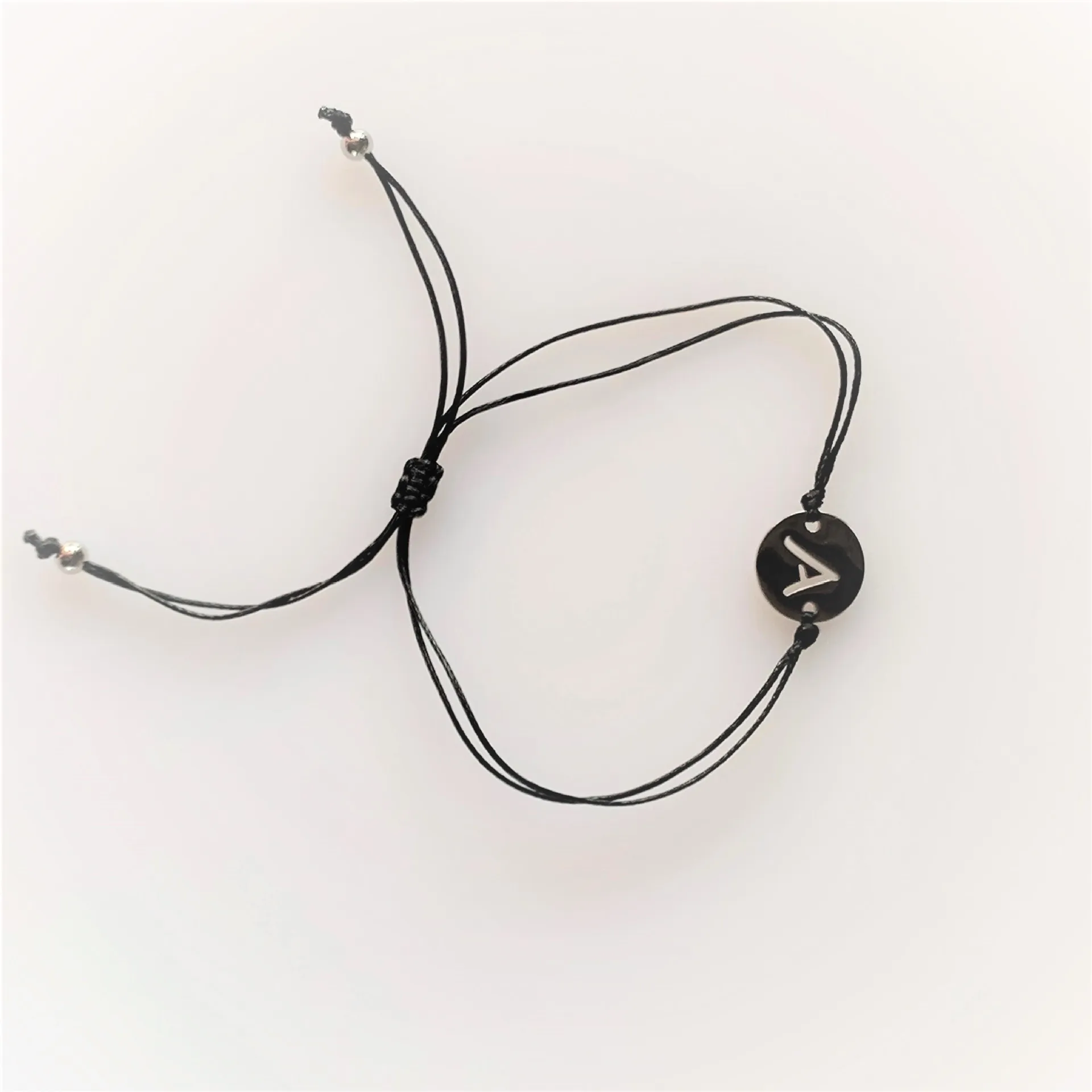 

Custom Handmade Jewelry Adjustable Black Rope String Cord Bracelet Stainless Steel Alphabet Initial Letter Charm Card Bracelets