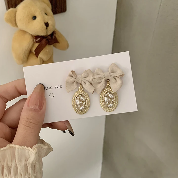 

Hot Sale 925 Silver Earrings Fabric Bow Earrings Pearl Pendant Earrings For Women, Picture shows