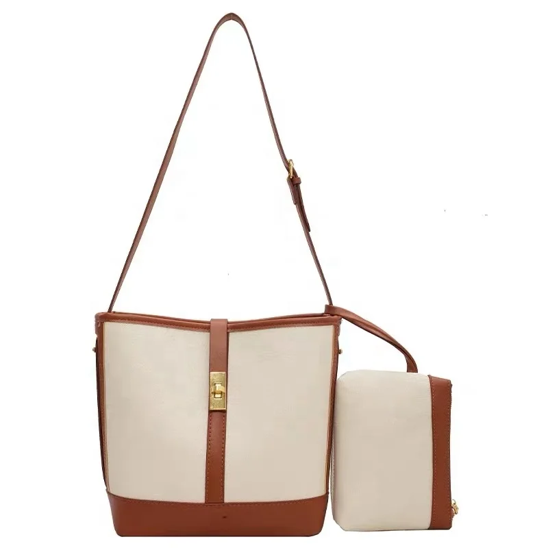 

The new temperament Korean version of the trendy canvas bucket bag fashion ladies pu stitching one-shoulder messenger bag 2021
