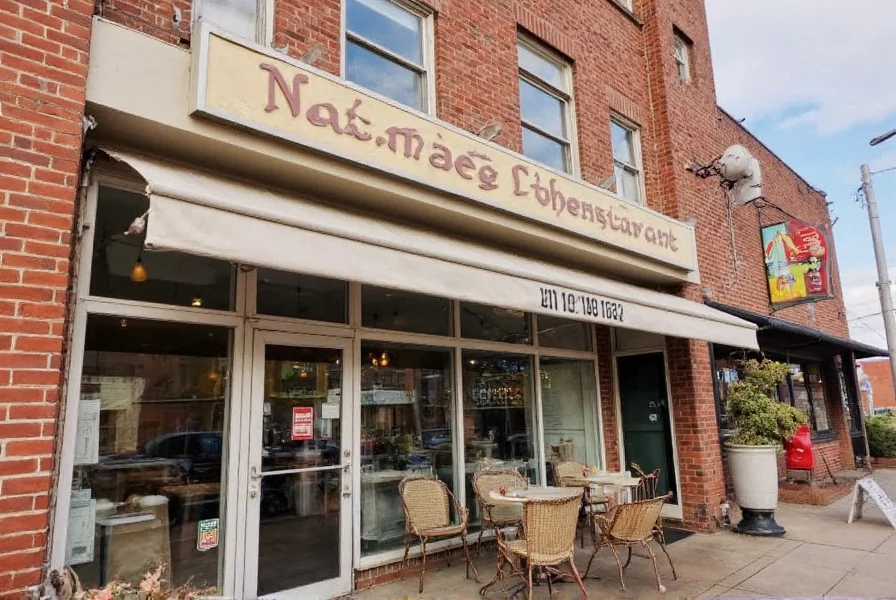 Contemporary American dining interior at Nutmeg Restaurant East Windsor showing wooden tables, soft lighting, and modern decor