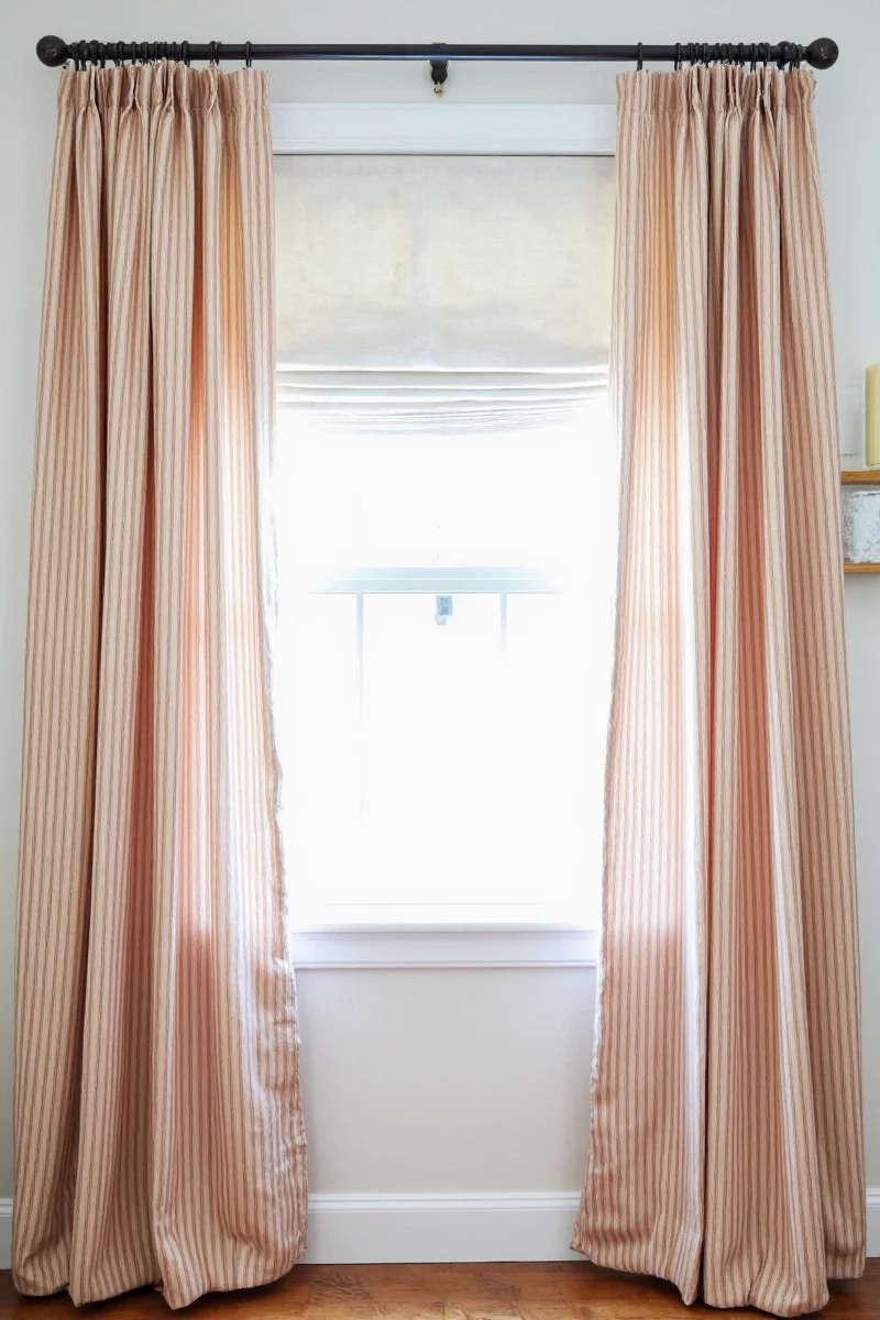 Bedroom with Curtains and Plantation Blinds