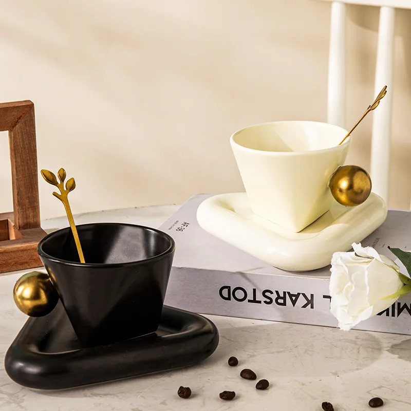 

Creative luxury 150ml geometric ceramic coffee cup and dish set personalized triangle gift Cup with ball handle