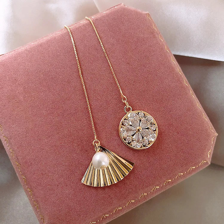 zircon luxury eardrop asymmetr