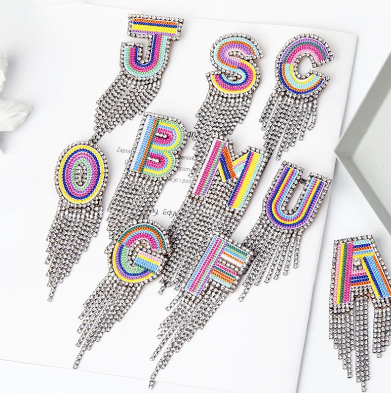 

Luxury New colorful crystal 26 letter word A-Z brooch Korea popular rhinestone tassel pins brooch for women Jewelry wedding Gift