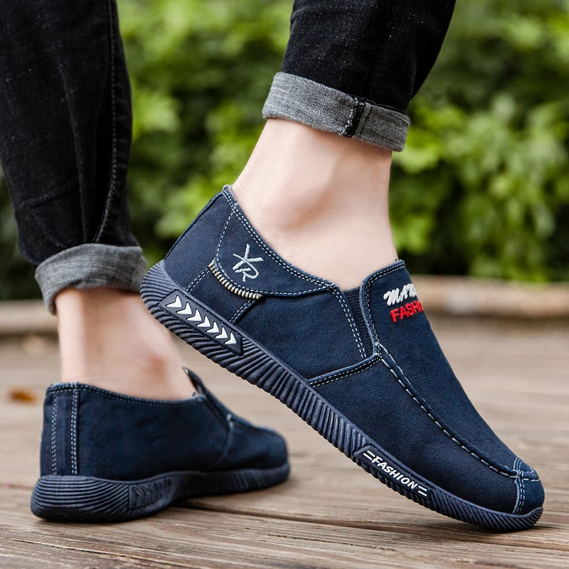 

2021 Customized spot wholesale breathable men's casual fashion sports running shoes slip on loafers driving canvas shoes for men, White