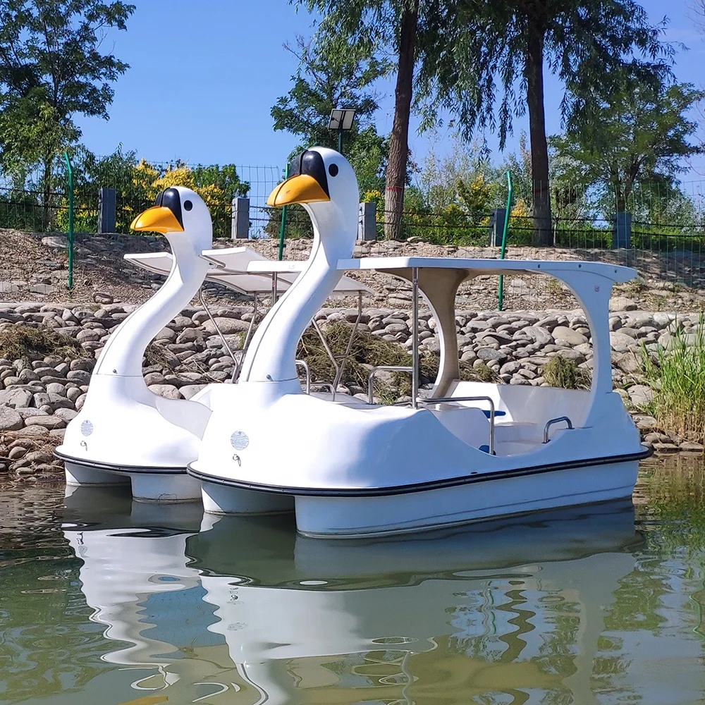 

Factory direct sales high quality swan boat thick fiberglass used pedal boats for sale, According to you