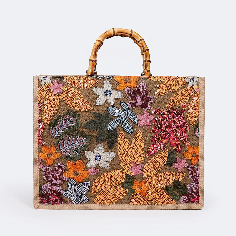 

Wholesale Hot Fashion Sequin Embroidery Tote Beach Bag New Handmade Woven Paper Straw Handbag with Bamboo Handles