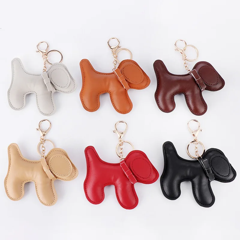 

New Arrival Luxury Leather Keychain Animal Puppy Shaped Leather Wrist Strap Keychain With Gold Thumb Trigger Lobster Hook