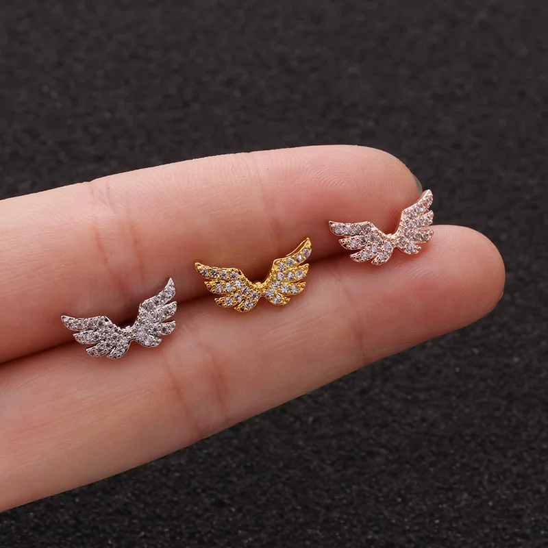 

2021 Sailing Piercing Jewelry Angel Wings Charms CZ Cartilage Stud Earrings Earlobe Angel Wings Screw Back Stud Earring